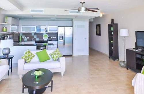 Welches Condo | 501 Ocean front condo at Ocean One Maxwell coast road Barbados