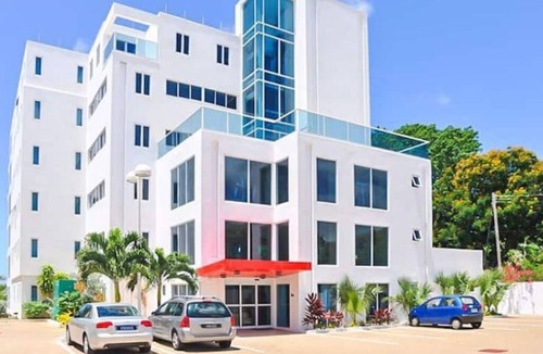 Welches Condo | 501 Ocean front condo at Ocean One Maxwell coast road Barbados