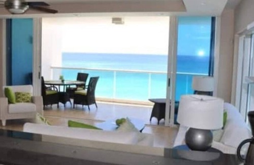 Welches Condo | 501 Ocean front condo at Ocean One Maxwell coast road Barbados