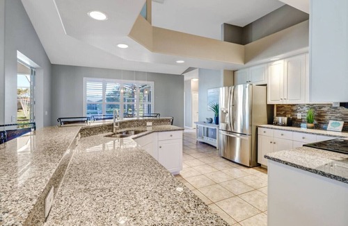 Caloosahatchee House | 5BR/3BA Waterfront Oasis in Cape Coral | Heated Pool & Spa + Private Dock | Gulf Access