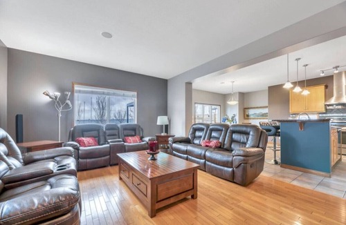 Chestermere House | 5BR Gem w/Pizza Oven, Theater & Views