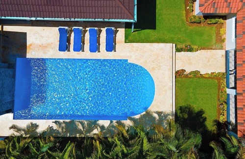 La Esplanada Villa | 5BR Villa: Waterfall Pool, BBQ, Steps to All Amenities