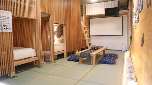 Maeda Apartment | 6つの個室のようなベッドルーム PrivateサウナとBBQテラス 恩納村で過ごす極上の休日 那覇空港送迎 宿泊者価格レンタカー有