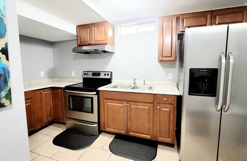 Dupont House | 6 bdrms-2 Kitchens-Patio & SUNROOM - Easy Access to Red Rocks and Downtown!