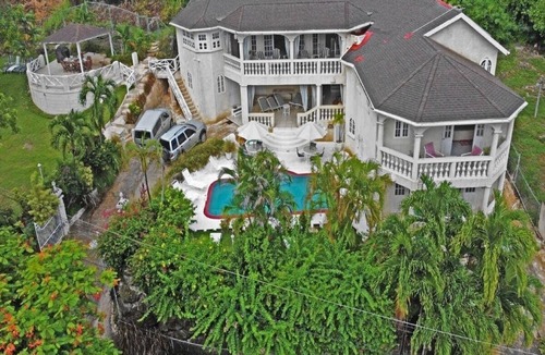 Checker Hall Villa | 6BR Charming Beachfront Villa w/Pool and Staff