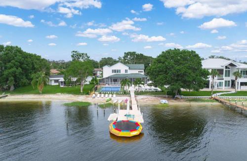 Sebring House | 6BR Lakefront Home w Pool Pickleball More