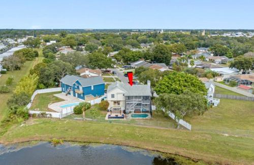 Largo Villa | 6BR Waterfront Heated Pool Hot Tub Game Room