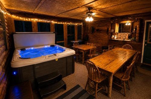 Mauston House | 8BR 5BA Huge Dog Friendly Log Cabin near Wisconsin Dells and Lake sleeps 25plus