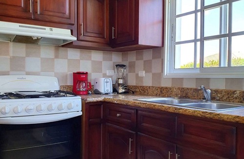 Urbanizacion Tavarez Villa | 9BD guest-friendly complex in central Sosua, 2 pools, WiFi/AC/cable TV/BBQ