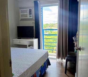 Cagayan de Oro Apartment | 9F The Loop Limketkai Condo Towers - Stay at Nancy- Spacious 1 Bedroom unit - Separate Living Room and Kitchen - Free Wifi - Smart TV - Balcony - Mountain View