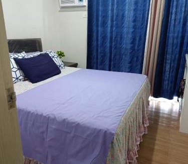 Cagayan de Oro Apartment | 9F The Loop Limketkai Condo Towers - Stay at Nancy- Spacious 1 Bedroom unit - Separate Living Room and Kitchen - Free Wifi - Smart TV - Balcony - Mountain View