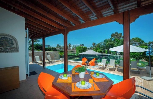 Protaras Villa | A Beachfront Villa with private Heated Pool (Additional charges apply)