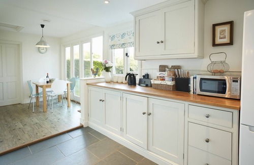 Wittersham Cottage | A charming, detached, weather-boarded cottage, set in a secluded location on the edge of the histori