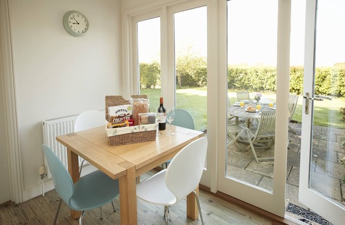 Wittersham Cottage | A charming, detached, weather-boarded cottage, set in a secluded location on the edge of the histori
