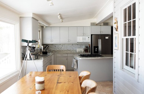 Eveleth House | A charming home on a beautiful peninsula on a crystal clear lake.
