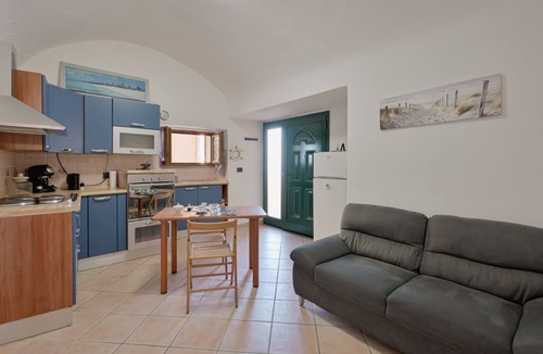 Vezzano Ligure Apartment | A comfortable 50 sqm apartment, perfect for two people, located on the ground floor of a period building.The property is located in Vezzano Ligure, a historic and scenic village in the province of La Spezia, ideal for those seeking a quiet yet convenient