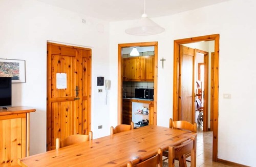 Lido Apartment | A comfortable 65 square meters apartment, perfect for six people, located on the first floor of a building without an elevator within a residential complex.The property is located in Alghero and enjoys an excellent location, close to the sea and several