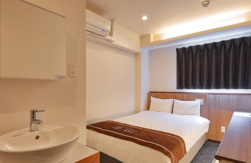 Shikitsuhigashi House | A double room / Osaka Ōsaka
