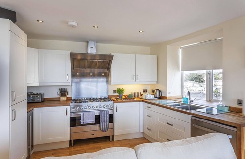 Brixham House | A few minutes’ walk from the harbour, with sea views and 7 bedrooms