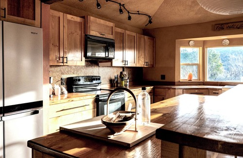 Cornville House | A high-design primary residence designed for slow mornings and creative resets in Page Springs. 3 king beds and pull out couch can accommodate up to 8 guests.