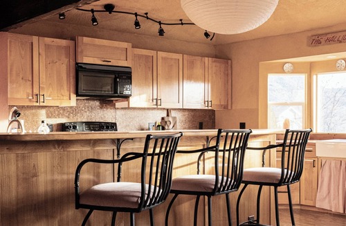 Cornville House | A high-design primary residence designed for slow mornings and creative resets in Page Springs. 3 king beds and pull out couch can accommodate up to 8 guests.