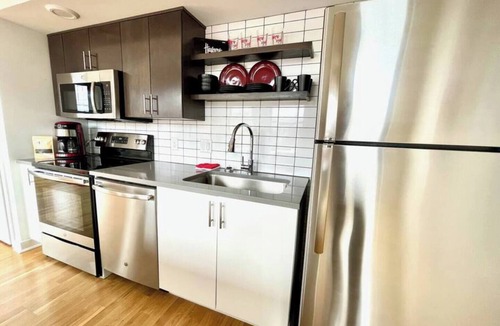 Old Market Apartment | A historic Husker themed, 1,300 square foot loft in the heart of the Old Market