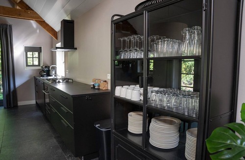 Ermelo House | A luxury group accommodation in which you can spend a nice time with your family or group of friends. This large robust house accommodates everyone, has a spacious living room, and has 8 bedrooms and 4 bathrooms.