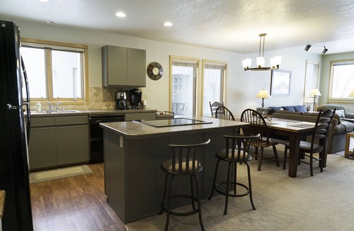 Big Sky Meadow Village Condo | A Million Dollar View Comfortable condo with outstanding view of Lone Peak