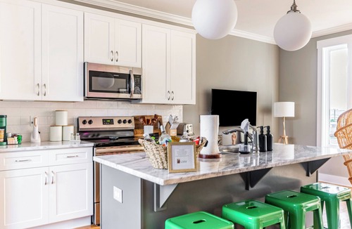 Katie Hill Neighborhood House | A modern two-bedroom/2.5 Bathroom townhome in East Nashville. Come enjoy this amazing rooftop! Our home includes a spacious garage for two vehicles. This newly built home is only a 10-min drive to most attractions including Broadway, Nissan Stadium,
