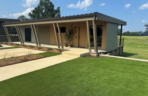 Brookhaven Cabin | A Porch overlooking a golf course is the perfect place to stay in Brookhaven