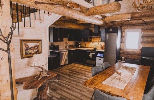 Riverport Cabin | A reconstructed German LogHaus and sanctuary of unmediated coastal observation.