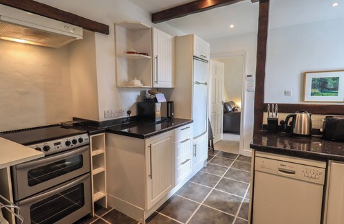 Staveley Cottage | A RIVER RUNS BY, with a garden in Staveley