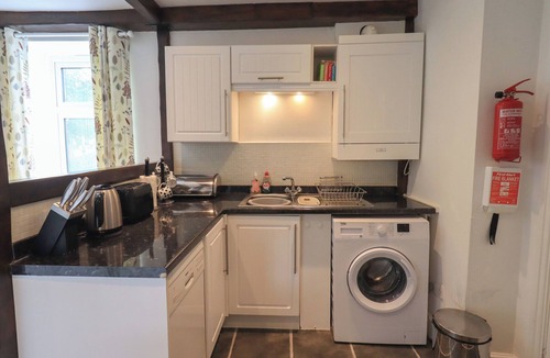 Staveley Cottage | A RIVER RUNS BY, with a garden in Staveley