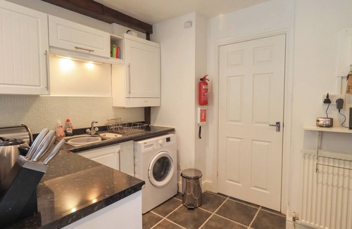 Staveley Cottage | A RIVER RUNS BY, with a garden in Staveley