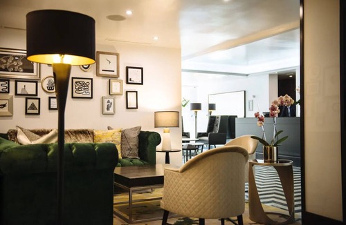 Norma Triangle Hotel | A Sophisticated Suite! Four Units with Furnished Living, Rooftop Pool, Balcony!