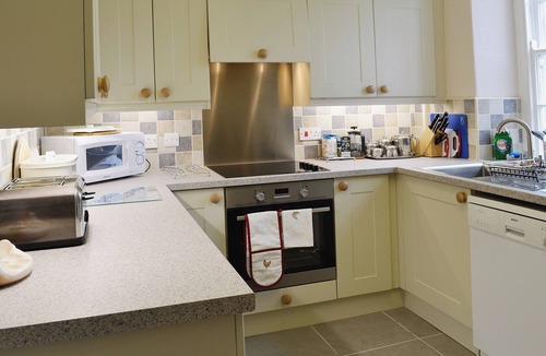 Llanystumdwy Cottage | A spacious detached property with an open fire and enclosed garden.