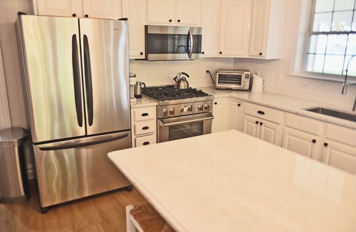 Rock Hall House | A stunning Chesapeake Bay sunset from a beautiful home with an inground pool!