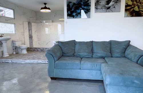Cabrera Hotel | A suite with ocean view balconies, walk-in shower, pool, fire pit, & more!