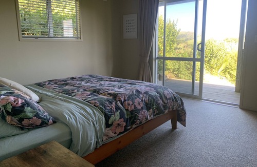Awhitu House | A sunset paradise, 3 bedroom home on a hill with views to the ocean