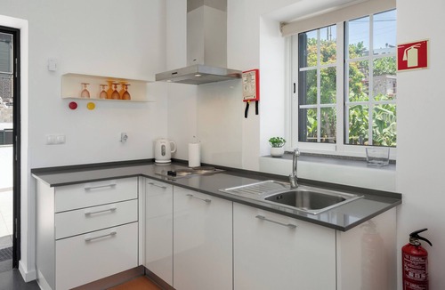 Arco da Calheta Villa | A tranquil balcony over the ocean | Grayci’s House