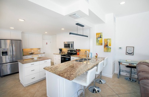 Lighthouse Point House | A Tropical paradise backyard pool, family friendly, Boat lift and Dock