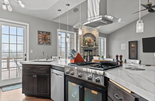 Forest Junction House | A warm & inviting modern retreat featuring on-site local brews & a home theater.