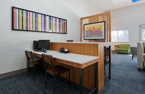 Martha Lake House | A warm, welcoming lobby with plush seating is just a taste of the service