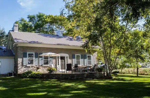 Loyalist House | A Waterfront Retreat in Limestone Home and Coach House on Amherst Island