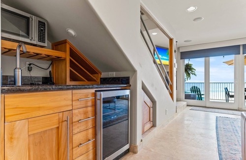 Carlsbad Village Condo | A Wave from it All Toes-in-the-sand