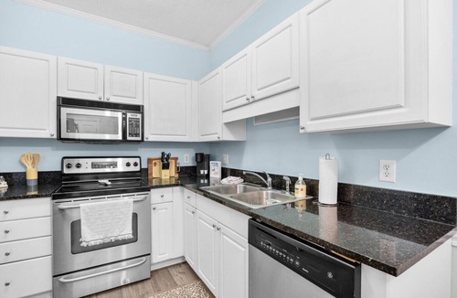 Vaught Apartment | A wave from it all < 1 mile to the beach!