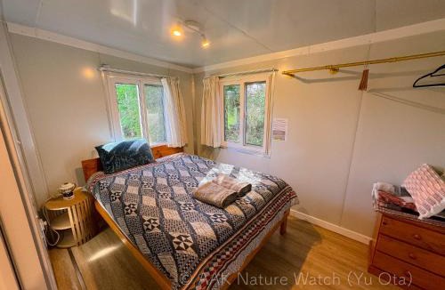 Malanda House | AAK cabin - standalone riverfront cabin
