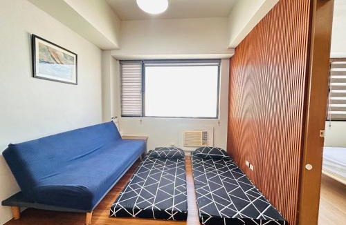 Kapitolyo Apartment | Ace Suites Residence next to the Water Spa - Budget Family Room
