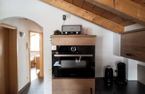 Marquartstein Apartment | Achentaler Alpentor 54 m² for 2-4 persons, eat-in kitchen, bedroom, shower/WC, balcony, WLAN