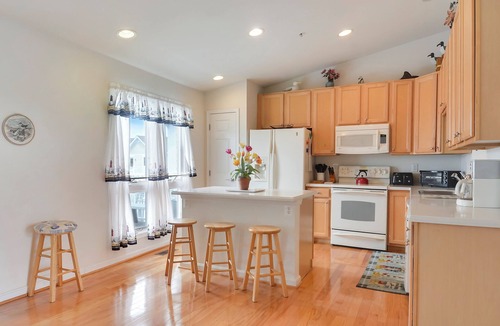 Bethany Beach House | Activities included up to $300 FREE PER WEEK! FREE DAILY ACTIVITIES! Waterfront location with bright and beachy decor this vacation townhome boasts incredible views from every level! Located in North Bethany close to the Indian River Inlet and ma